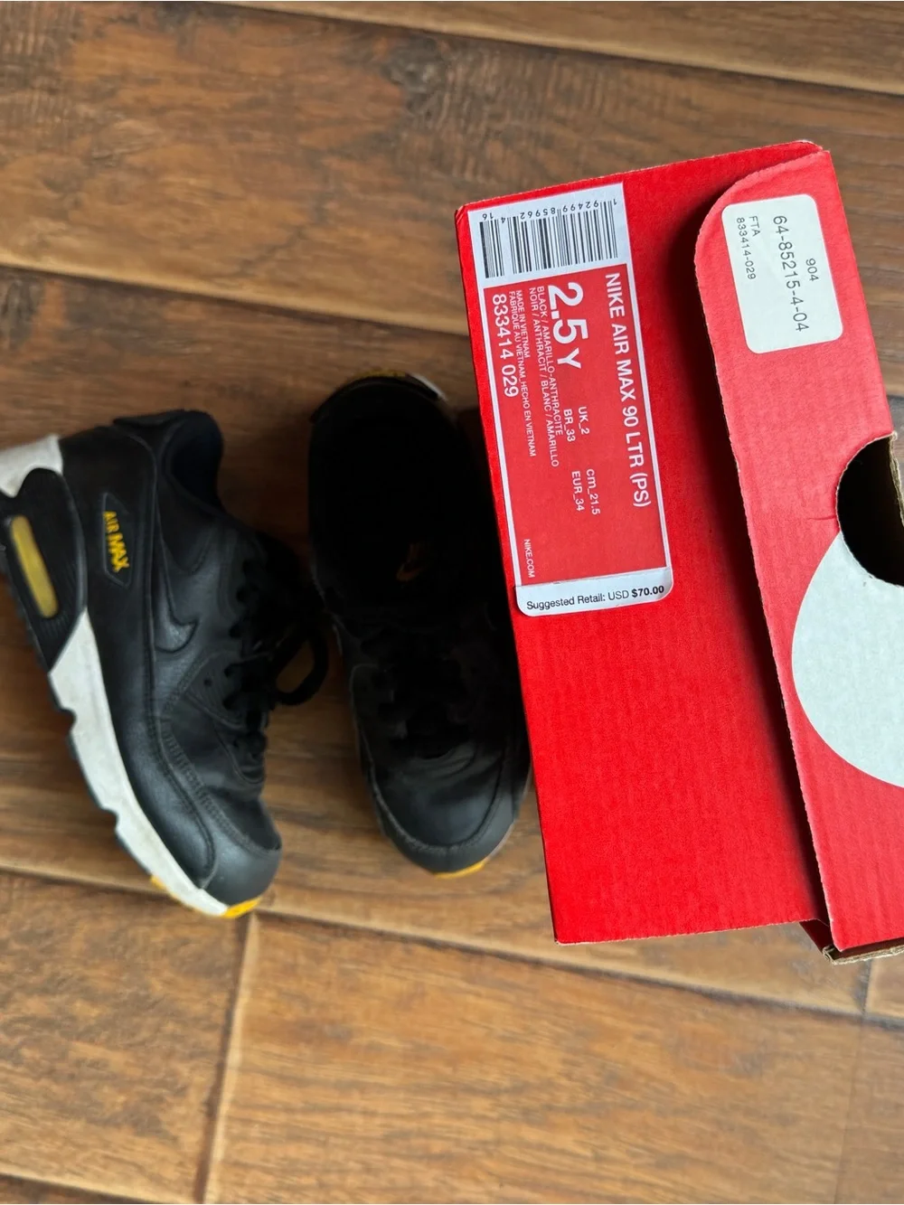 Nike Black Sneakers with Yellow Accents